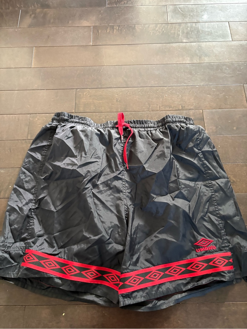 Vintage Umbro Black Athletic Shorts with Red Trim